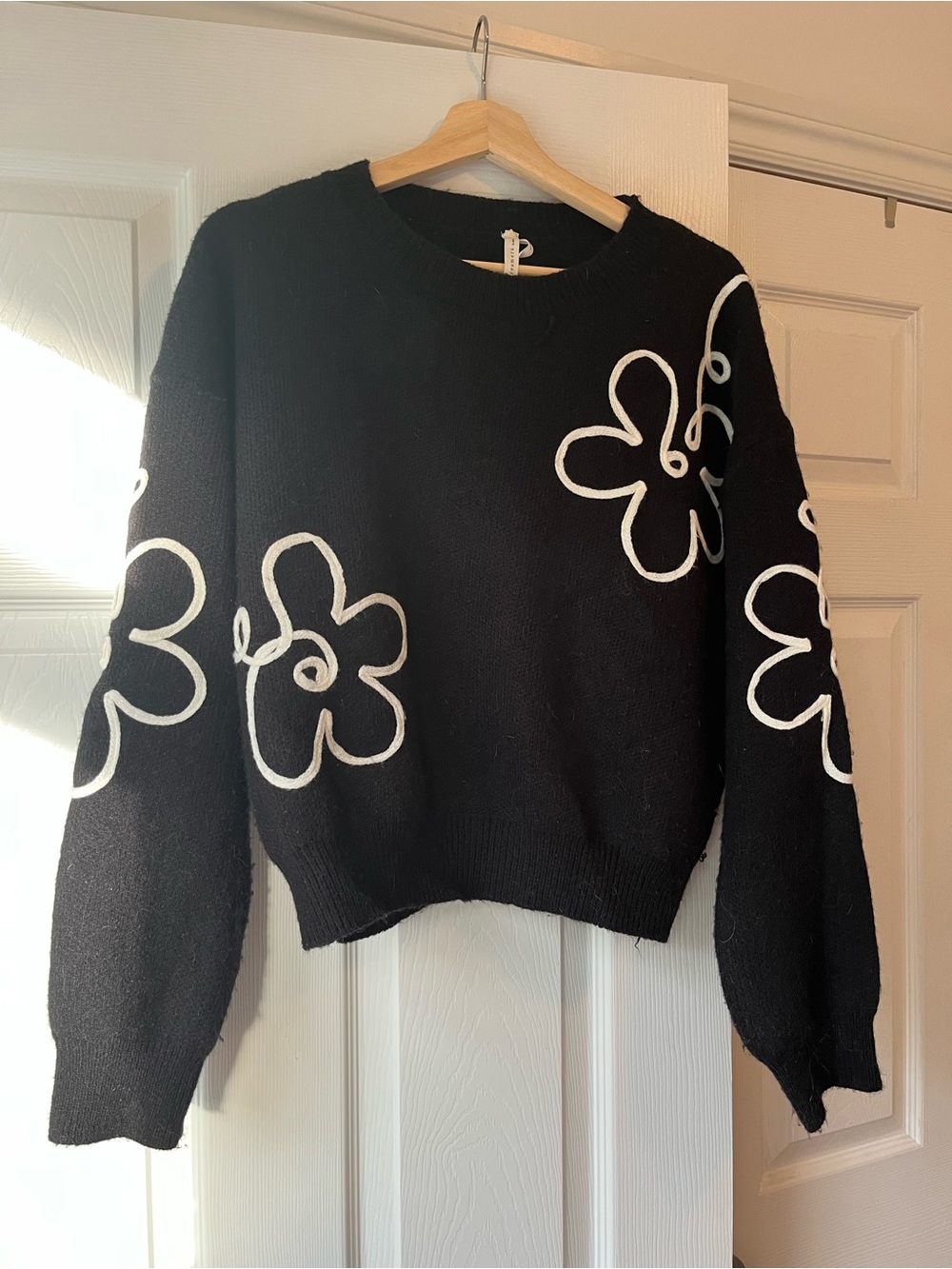 Dreamers Black Crewneck Sweater with White Floral Appliqué